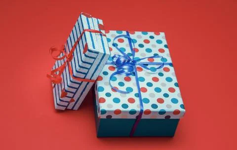 Holiday gift boxes, presents isolated on red background. Stock Illustration