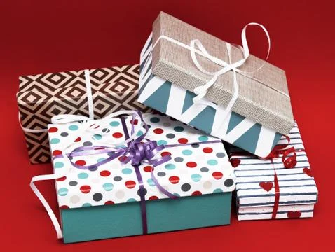 Holiday gift boxes, presents isolated on red background. Stock Illustration