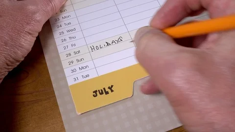 Holiday note written in a calendar. Stock Footage 91655874