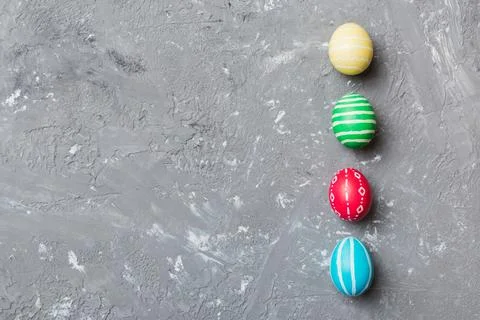 Holiday preparation Multi colors Easter eggs on colored background . Pastel c Stock Photos