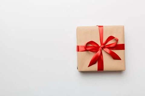 Holiday present box over colored background, top view. Copy space for design Stock Photos