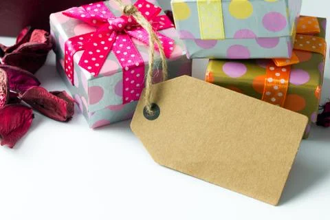 Holiday presents with empty tag Stock Photos