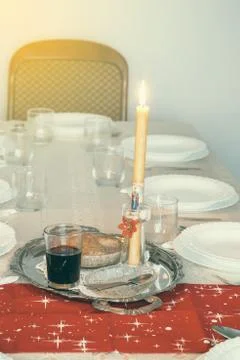Holiday table with candle Stock Photos