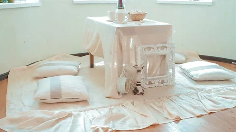 Holiday Table With Pillows in the Room Stock Footage 68689835