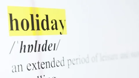 Holiday Text Macro Shot Highlighted in Yellow Color On Computer Screen Stock Footage 123224312