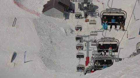 Holidaymakers climb the mountains by cable car Stock Footage 73352859