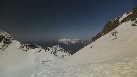 Holidaymakers climb the mountains by cable car Stock Footage