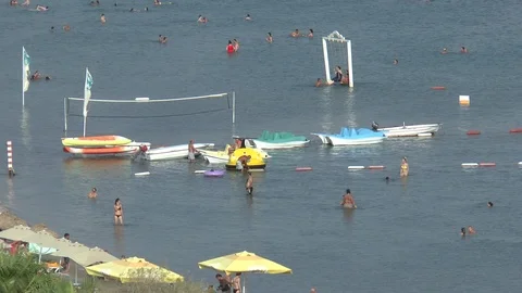 Holidaymakers Having Fun In The Sea Stock Footage 95325962
