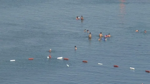 Holidaymakers In The Sea Stock Footage 95326078
