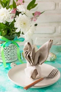 Holidays Easter table Setting with spring flowers. Copy space. Stock Photos