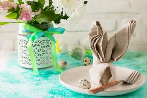 Holidays Easter table Setting with spring flowers. Stock Photos