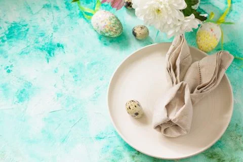 Holidays Easter table Setting with spring flowers. Stock Photos