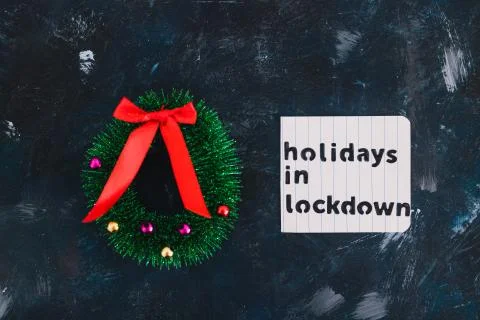 Holidays in lockdown due to covid, mini decorative Christmas tree pines with  Stock Photos