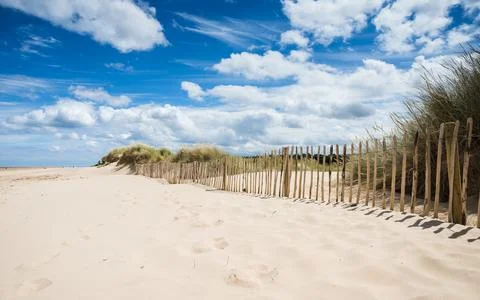 Holkham beach under a blue sky Stock Photos