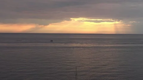 Holland Beach Sun rays w Boat HD Video stock 139215459