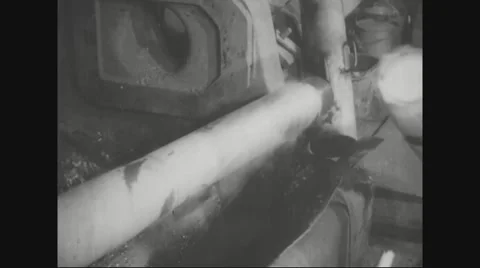 Hollow iron being put into boring machine Stock Footage 43312079