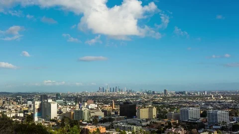 Hollywood and Los Angeles With a Tiny Cloud Day Timelapse Stock Footage 76773736