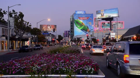 Hollywood Beverly Hills California CA  famous Sunset Blvd traffic at night Stock Footage