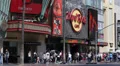 Hollywood Boulevard Dolby Theatre Hard Rock Cafe Walk Fame People Crowds Passing HD Footage