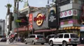Hollywood Boulevard Hard Rock Cafe Walk of Fame Car Passing Traffic Rush Hour LA HD Footage