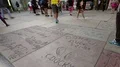 Hollywood Chinese Theater Handprints Time Lapse Tourists Walking 4k or 4k+ Resolution