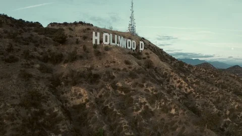 Hollywood Sign pullback with moon - 4K - Drone Stock Footage 126350359