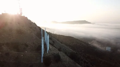 Hollywood Sign reveal at sunrise Stock Footage