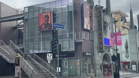 Hollywood Streetsign panning down empty Walk of Fame during coronavirus lockdown Stock Footage 133826490