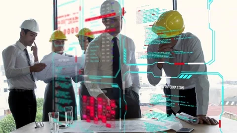 Holo UI projecting red data blocks urging team in hard hats leaning over plans Stock Footage 335466198