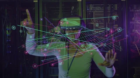Hologram appearing tech wearing VR lanyard pointing swiping managing network at Stock Footage 331635503