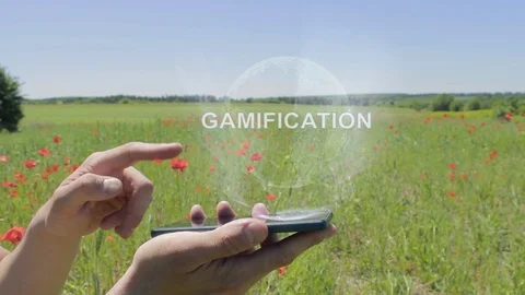 Hologram of Gamification on a smartphone Stock Footage 107220792