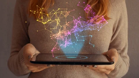 Hologram screen on a tablet with digital datas, geometric сstructure Vidéo 105032744