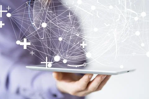 A hologram of a sphere made of interconnected dots on a businessman's tablet  Stock Photos
