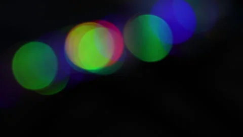 Holographic Bokeh Light String Moving Up Stock Footage 309491478