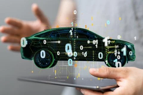 Holographic car with binary numbers hovering above a tablet Foto stock