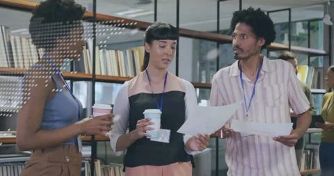 Holographic code overlay appearing over team members causing document exchanging Video stock 311454584