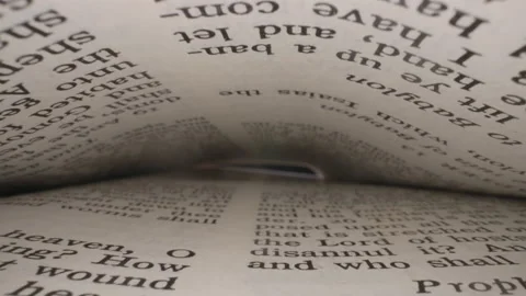 Holy bible between the pages macro close up slider Stockbeeldmateriaal 145154118