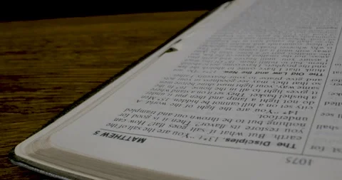 Holy Bible Macro Man Hand Turning Pages Gospel According To Matthew Stock Footage 288229946