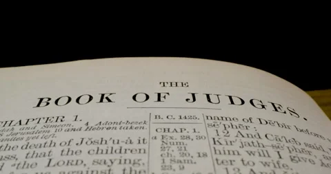 Holy Bible Macro Text The Book Of Judges Tilt Down Stock Footage 291189458