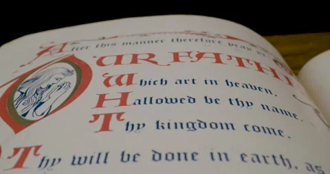Holy Bible Macro Text Our Father Which Art In Heaven Tilt Down Vidéo 299954814