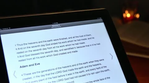 The Holy Bible on a tablet computer Stock Footage 12389692