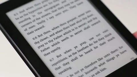 The Holy Bible / Touchscreen Ebook / e-ink Stock Footage 46719132