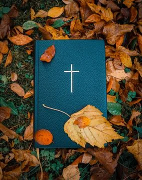 The Holy Christian Bible, Word of God with black cover and cross on it Stock Photos