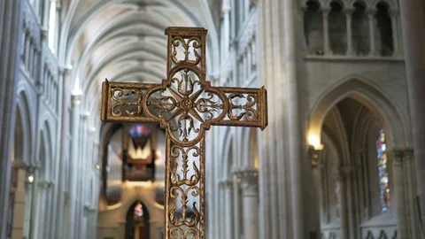 Holy crucifix in a bright cathedral Stock Footage