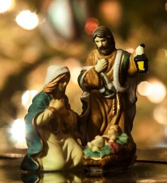 Holy family closeup, joseph, virgin mary and baby jesus figurine Stock Photos