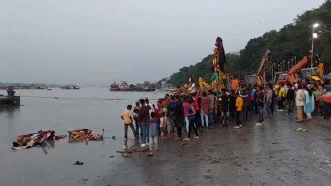 The Holy ganges pollution taking place  due to immersion  of idols Stock Footage 172042814