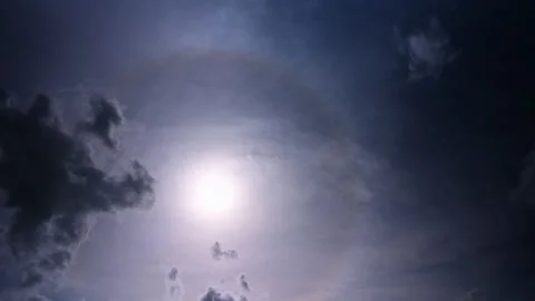  holy grail mesmerizing time lapse of sun halo and clouds Stock Footage 165289320