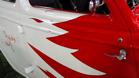 Holy hell red white louvered hotrod Stock Footage 169773609