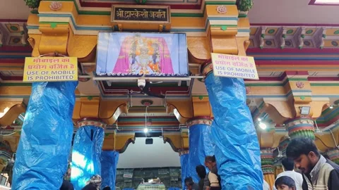 Holy hindu temple with devotee crowed at festival at day video is taken at Stock Footage 309940389