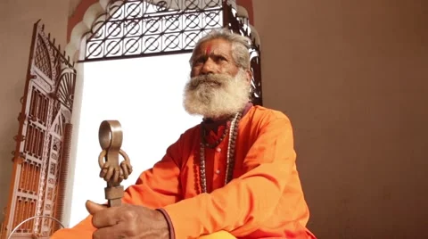 Holy indian authentic  Priest doing meditation inside the temple Stock Footage 55550359